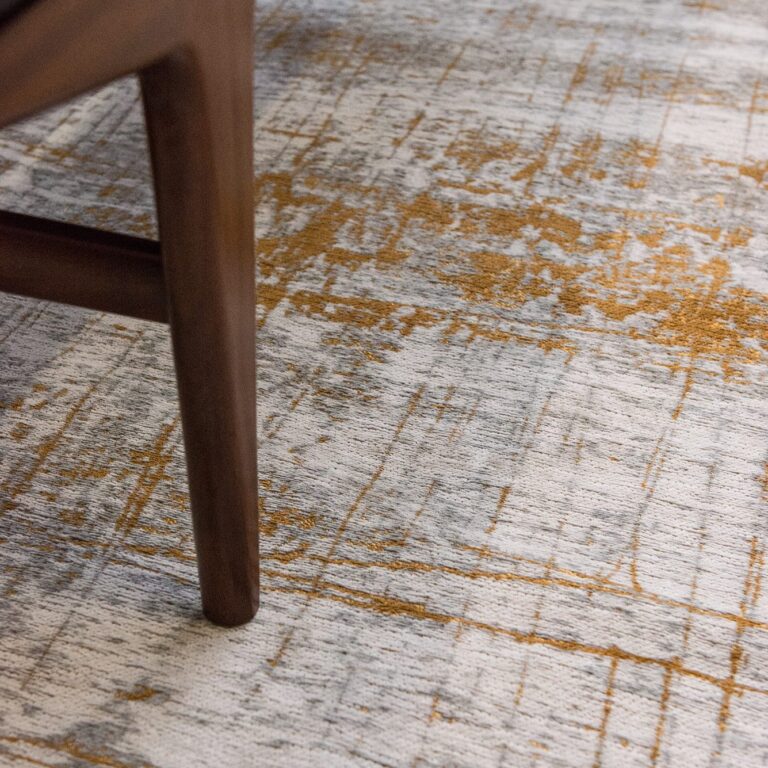 Columbus gold rug from Louis De Poortere